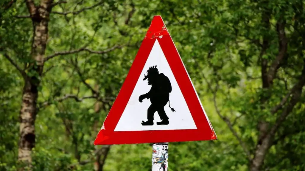 red and black dog signage - business threats